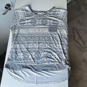 This pajama top from cuddl duds is in a size women’s large.